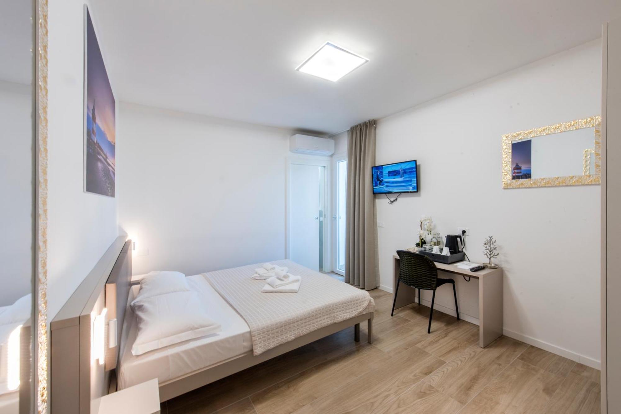 Guesthouse Stadio Lignano Sabbiadoro Esterno foto