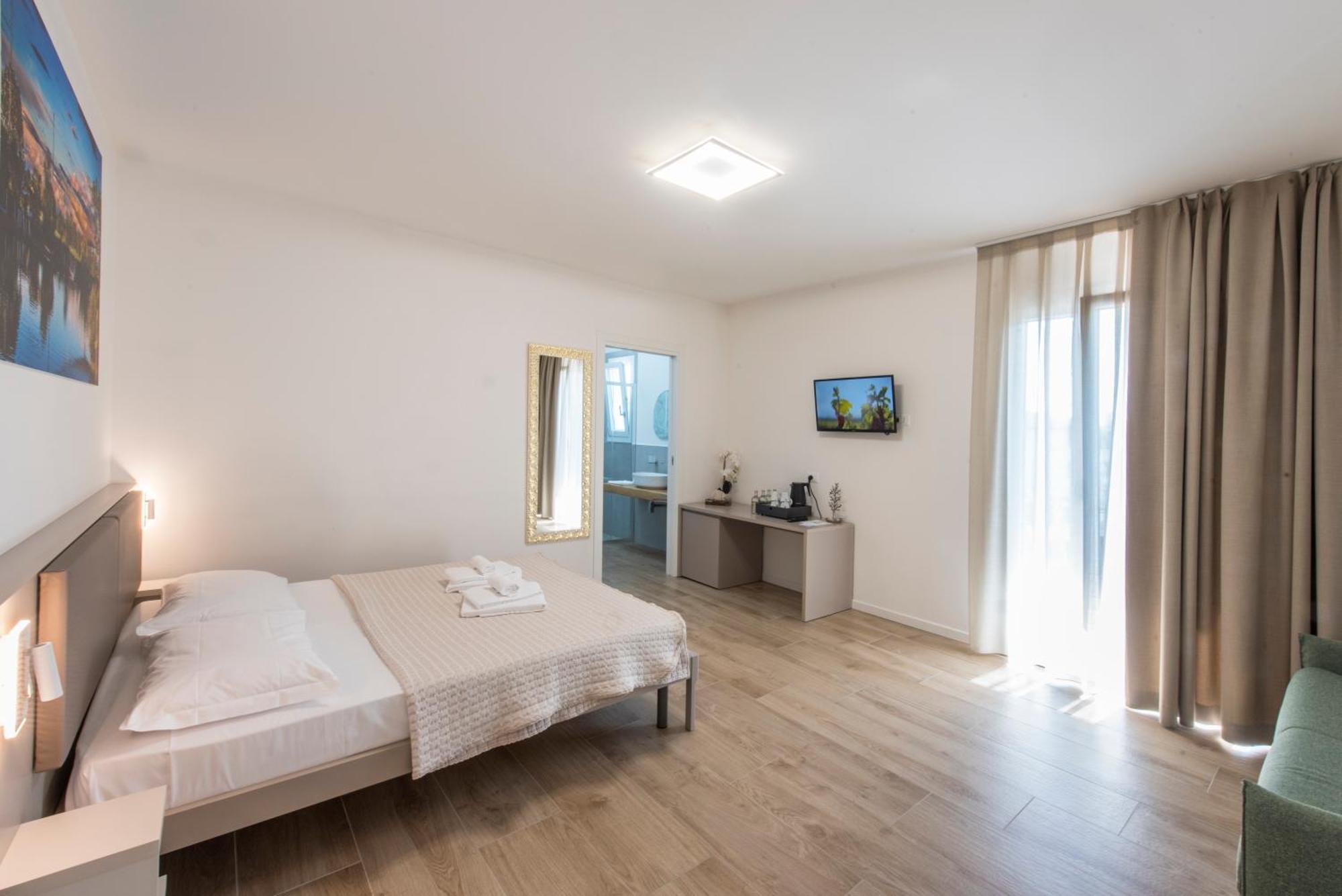 Guesthouse Stadio Lignano Sabbiadoro Esterno foto